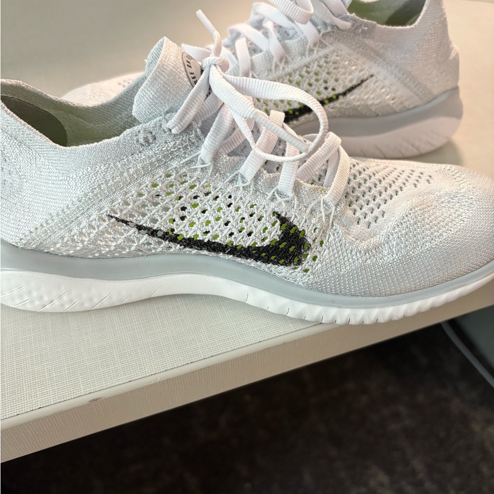 Nike White and Black Athletic Shoes with Flyknit Design